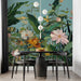 A dining room wall decorated with a large floral mural creating a calming garden atmosphere.