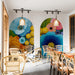 Modern cafe design decorated with a colorful floral wall mural and minimalist furniture