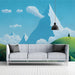 Whimsical nature mural backdrop in a bright, airy entryway with scattered toys