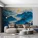 A calm living room interior with the blue mountain mural creating a peaceful backdrop for wood furniture.