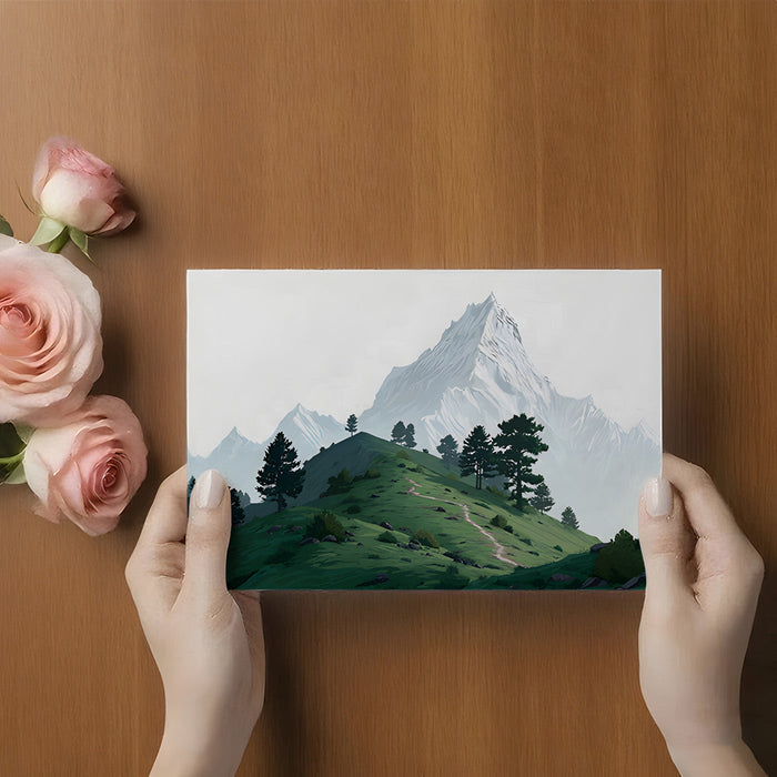 A serene home office with an alpine mountain mural creating a wide-open feeling behind a wooden desk.