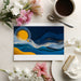 Modern office space with a navy and gold celestial mural creating a focused work atmosphere.