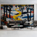 A bright, eclectic living room with a storybook-inspired winter village wallpaper mural on the main feature wall.