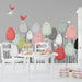 Whimsical avian wall covering styled in a cheerful modern playroom area