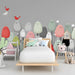 Playful bird pattern wallpaper installed in a bright modern nursery room