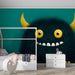 A child's bedroom featuring a fun monster mural on the main feature wall.