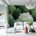 A cozy commercial space featuring a sleeping white cat wallpaper that adds a whimsical touch to the baby room.
