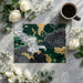 Contemporary living room featuring a bold abstract landscape mural with organic black, green, and gold shapes.