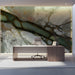 Minimalist office interior with a sweeping green and gold fluid art accent wall