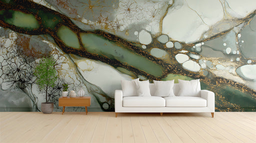 Modern entryway wall with abstract green and gold fluid art mural behind a beige sofa