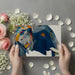 Creative home office with an artistic elephant mural on the main accent wall