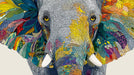 Close up of an elephant portrait composed of colorful mosaic tiles and vibrant abstract feathers
