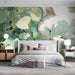 A cozy bedroom featuring a peaceful cat mural on the wall, styled with neutral furniture and soft lighting.