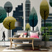 Creative studio space decorated with an abstract pixel tree and building wallpaper design.