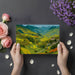 Bright home office with a scenic mountain terraced valley mural wallpaper