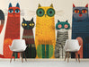 The cat wallpaper installed in a colorful child's entryway with wooden furniture.