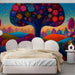 A cheerful bedroom with a vibrant floral meadow mural featuring dots and bold colors.