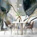Modern dining room featuring a green and gold watercolor wallpaper on the main feature wall