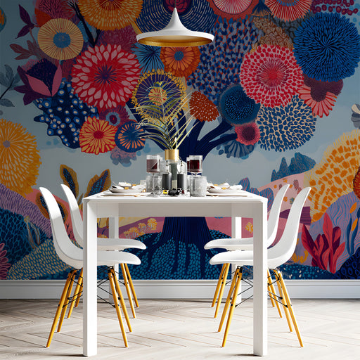 Playful floral dreamscape mural wallpaper installed in a colorful dining room with soft textile bedding.
