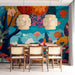 A colorful, whimsical wall mural installed behind a modern velvet sofa in a bright dining room.