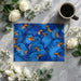 Cozy breakfast nook with a vibrant bird pattern mural creating a cheerful dining environment