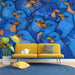 Modern home office featuring a whimsical blue bird wallpaper mural on the main accent wall