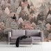 A tranquil living room interior with the soft pink manor forest mural as the focal point.
