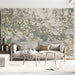 Modern living room featuring an abstract gold and green line art wall mural behind a velvet sofa