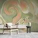 Modern study featuring a soft sage and peach abstract line art mural