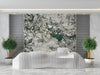 Modern reception featuring an abstract ink botanical wall mural as a backdrop