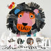 Playful lion mural installed on a nursery wall above a minimalist wooden crib