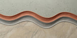 Abstract wallpaper pattern with layered curves of sage green, terracotta, gray, and beige marble texture
