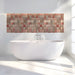 The mosaic tile mural installed as a feature wall behind a minimalist bathroom sofa.