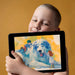 Whimsical playroom interior with a large illustrative dog mural on the feature wall