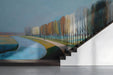 A cozy library hallway featuring a riverside mural on the accent wall behind the bed frame.