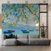 Tranquil commercial space feature wall with watercolor boat mural and minimalist light wood furniture