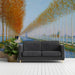 A serene entryway retreat with a large landscape wall mural that opens up the space behind the bed frame.