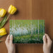 Nature themed green forest wall mural installed in a cozy dining room