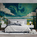 Bedroom interior featuring an artistic countryside mural behind a neutral cream sofa.