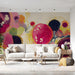 Contemporary living wall decorated with a vibrant abstract mural in shades of plum and hot pink