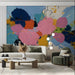 Dining room interior with a bold expressive art wall mural and modern furniture