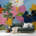 Modern living room featuring a vibrant abstract mural on the main accent wall