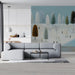 A bright, peaceful bedroom featuring a winter forest mural on the headboard wall with cozy white bedding.