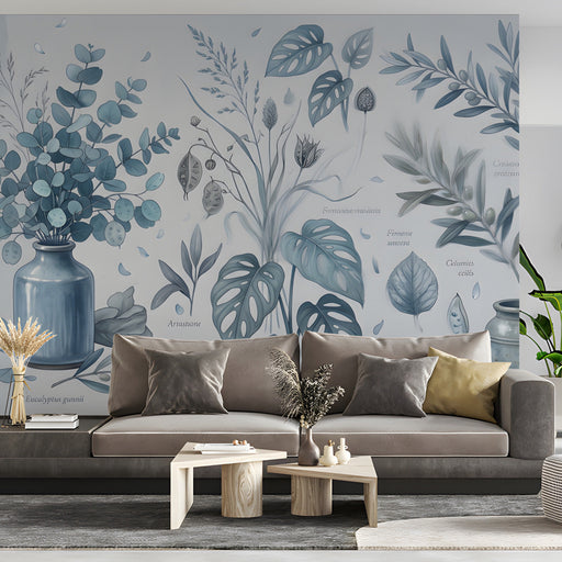 A bright, airy home office featuring a botanical blue sketch wall mural behind a minimalist wooden desk.