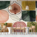 A cozy cafe wall decorated with a stylish botanical fruit pattern wallpaper.