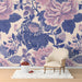 Study with vintage peony floral mural wallpaper on an accent wall behind a mahogany table