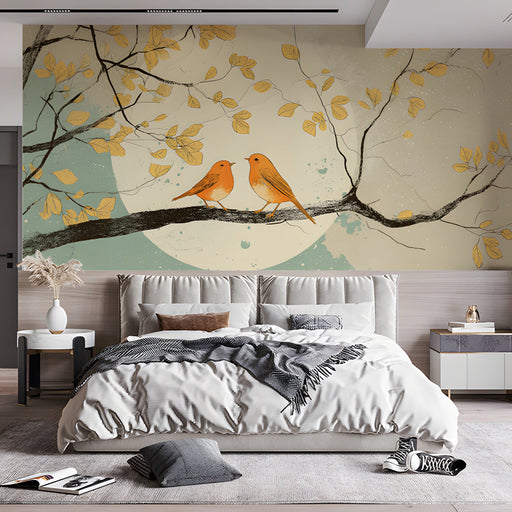 Modern bedroom featuring a serene bird and branch nature mural wallpaper behind a light gray sofa