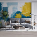 Creative home study room with a graphic city mural behind a wooden desk