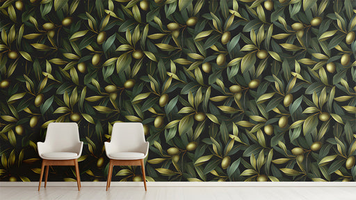 Moody entryway with olive branch wallpaper on a statement wall behind a wooden table