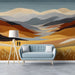 An entryway lounge area featuring a large-scale landscape wallpaper mural with brushstroke texture.